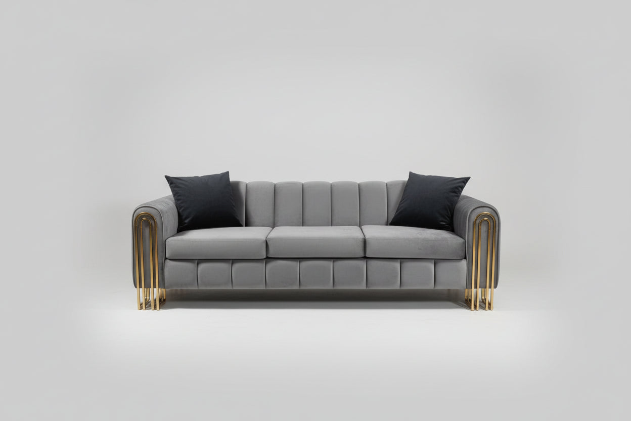 Gray sofa with black cushions on a white background