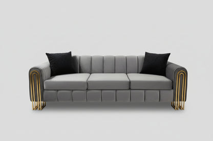 Gray sofa with decorative pillows in a showroom setting